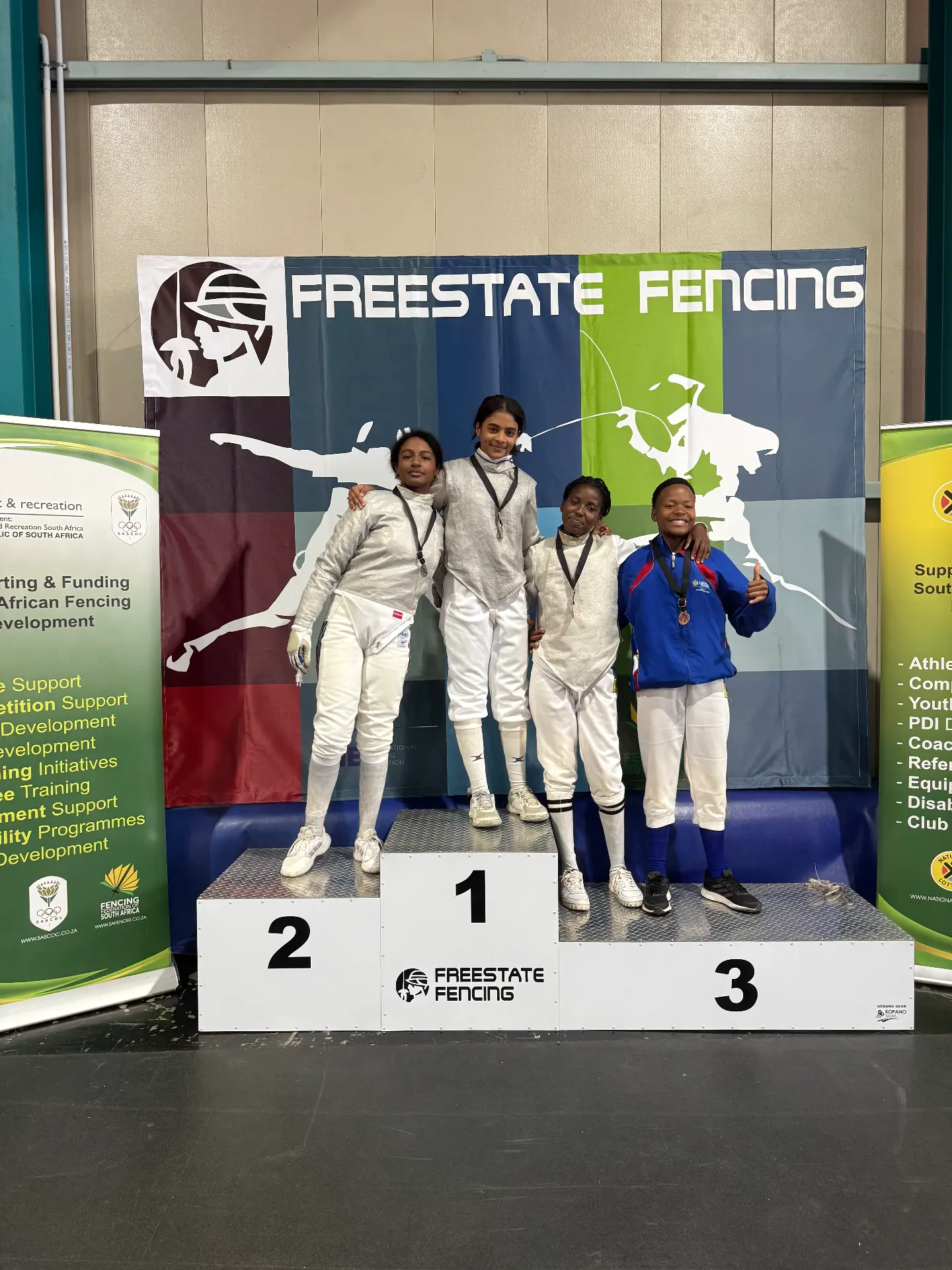 Youth women's foil podium at the Free State Open with KZN fencers on the top steps