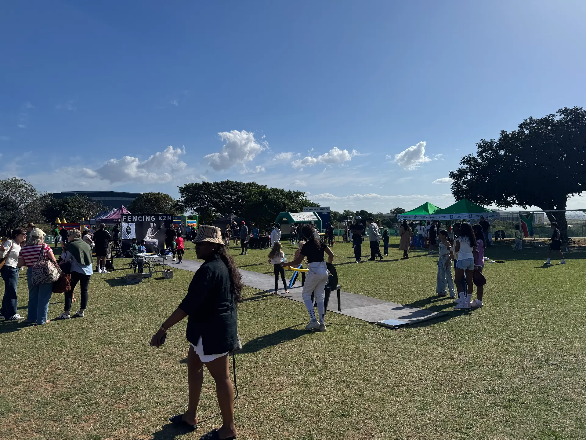 Families trying fencing at the Reddam House Umhlanga Carnival