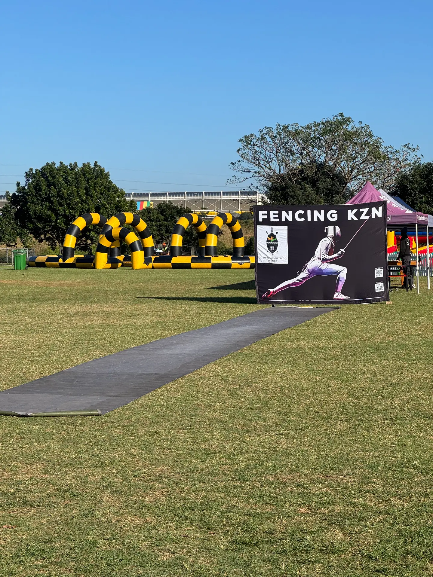 The Fencing KZN piste and branded banner set up on the carnival field
