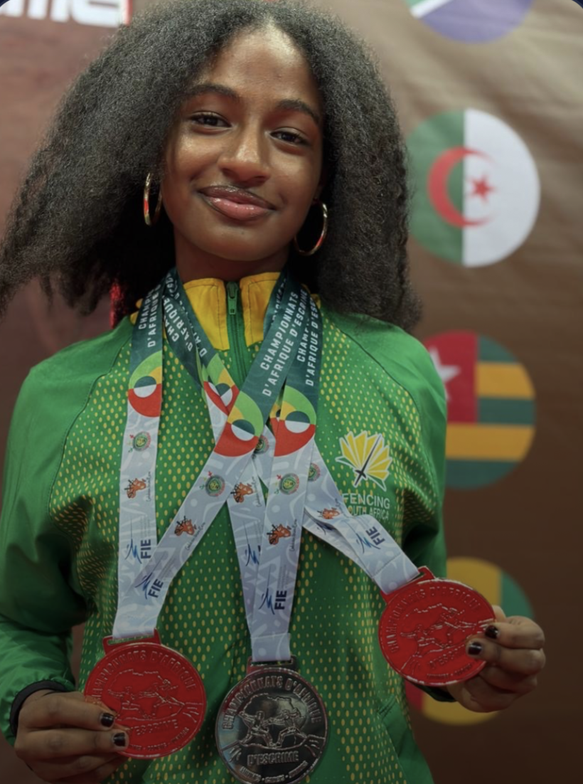 Gianna McIntosh with her medals at the Junior African Championships in Senegal
